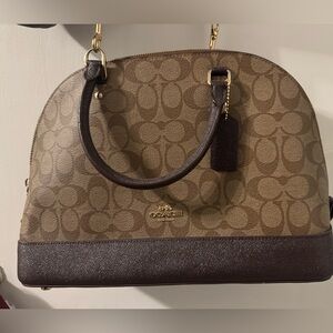 Coach leather handbag in brown with burgundy
